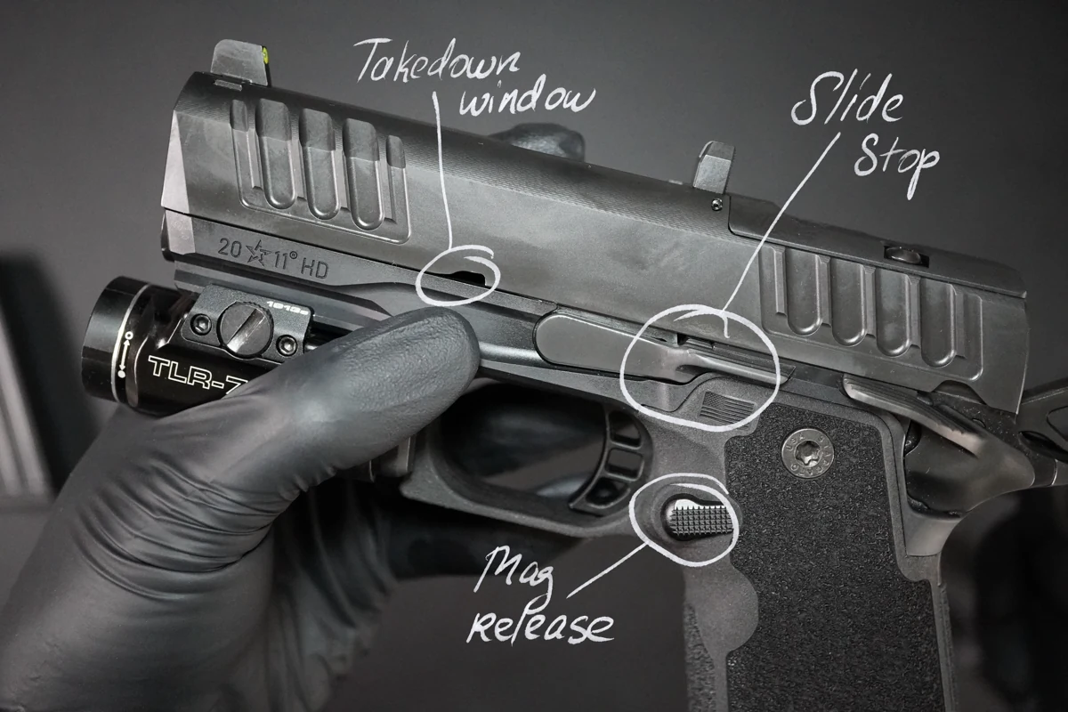 Staccato HD 3.6 with the takedown window, slide stop, and magazine release annotated