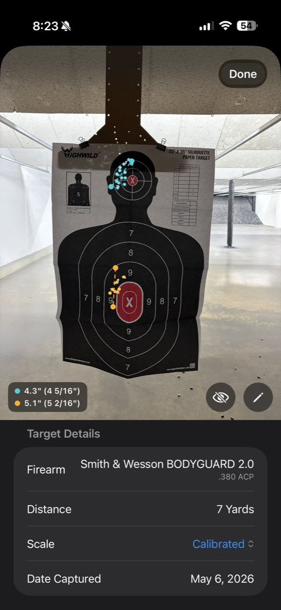 A measured target — head and chest detected as separate groups, extreme spread shown for each (4.3″ teal, 5.1″ amber)