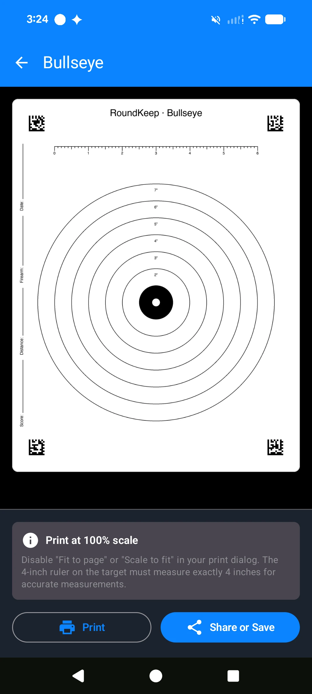 A RoundKeep Bullseye target ready to print at 100% scale, with a ruler to verify the size